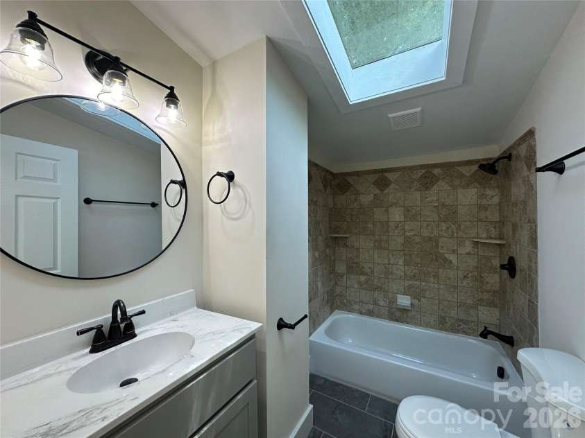 123 State Street, Asheville, NC 28806.  MLS# CAR4350606, YatesRealty ID 10115. Bath 1