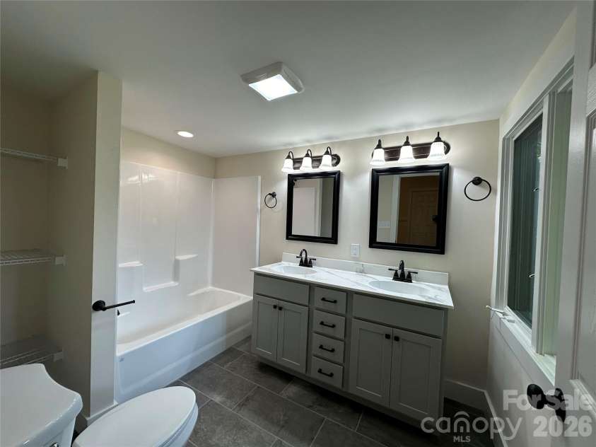 123 State Street, Asheville, NC 28806.  MLS# CAR4350606, YatesRealty ID 10115. Bath 2