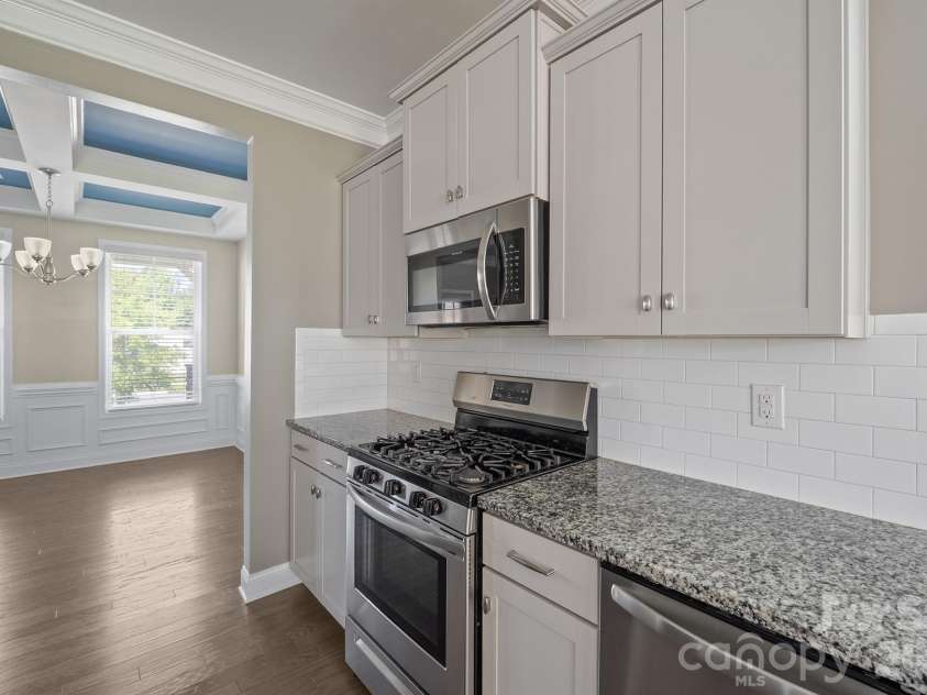 2358 Red Birch Way, Concord, NC 28027.  MLS# CAR4352060, YatesRealty ID 10116. Dining Room Entry from Kitchen