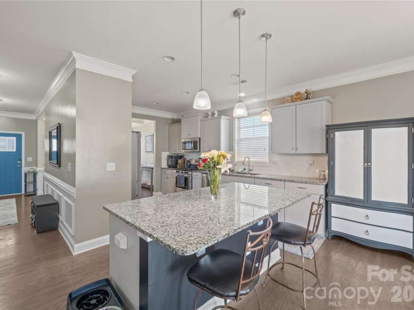 2358 Red Birch Way, Concord, NC 28027.  MLS# CAR4352060, YatesRealty ID 10116. Kitchen Island + Entry Foyer