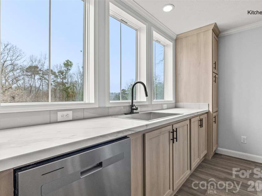 1105 Marion Street, Lancaster, SC 29720.  MLS# CAR4353257, YatesRealty ID 10118. Stunning front windows with expansive view 
