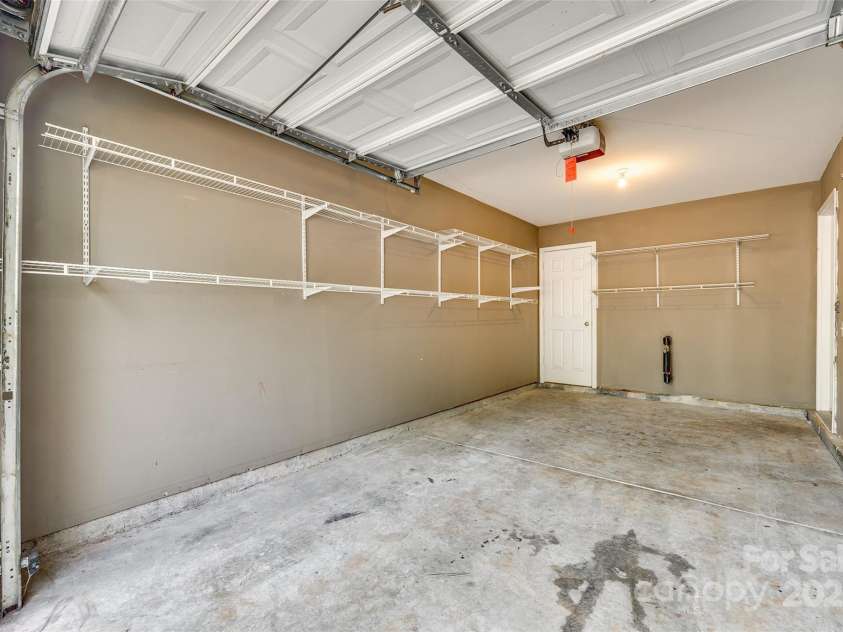 5206 Fire Water Lane, Fort Mill, SC 29707.  MLS# CAR4250029, YatesRealty ID 10118. Garage with Storage Closet
