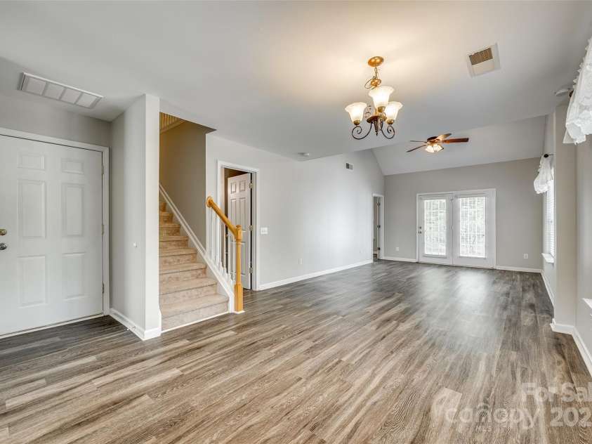 5206 Fire Water Lane, Fort Mill, SC 29707.  MLS# CAR4250029, YatesRealty ID 10118. Laminate Flooring throughout Main Level