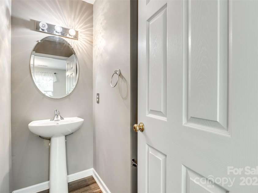 5206 Fire Water Lane, Fort Mill, SC 29707.  MLS# CAR4250029, YatesRealty ID 10118. Powder Room on Main Level