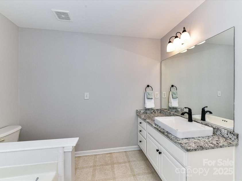 6005 Abergele Lane, Matthews, NC 28104.  MLS# CAR4250164, YatesRealty ID 10119. 