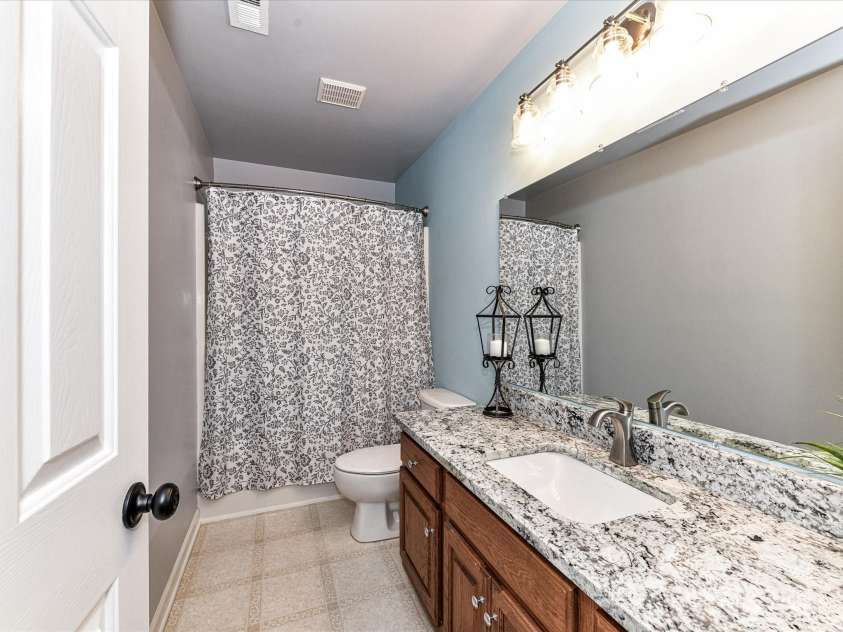 6005 Abergele Lane, Matthews, NC 28104.  MLS# CAR4250164, YatesRealty ID 10119. 