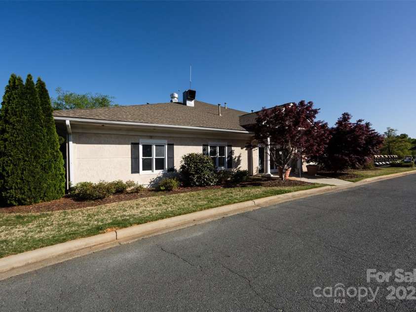 6005 Abergele Lane, Matthews, NC 28104.  MLS# CAR4250164, YatesRealty ID 10119. The Divide Golf Clubhouse