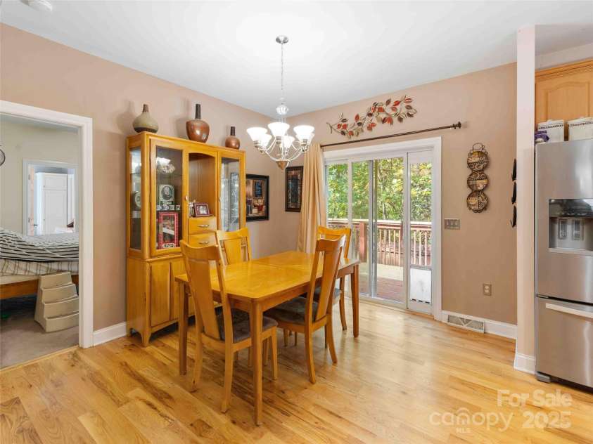 37 C Creek Lane, Pisgah Forest, NC 28768.  MLS# CAR4314709, YatesRealty ID 1012. Open dining area conveniently located off the kitchen and living room