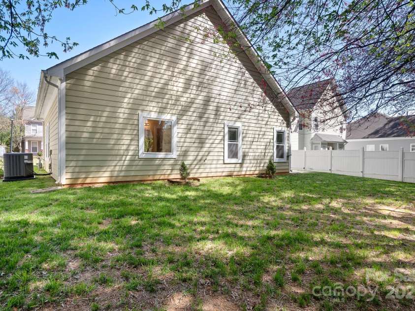 19221 Coachmans Trace, Cornelius, NC 28031.  MLS# CAR4241031, YatesRealty ID 10121. Another rear view of the home.