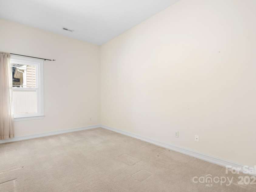 19221 Coachmans Trace, Cornelius, NC 28031.  MLS# CAR4241031, YatesRealty ID 10121. Secondary bedroom