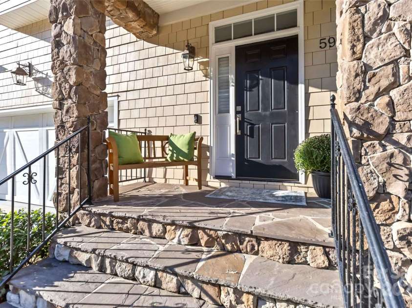 5916 Bridger Court, Charlotte, NC 28211.  MLS# CAR4184678, YatesRealty ID 10123. Beautiful stone front porch