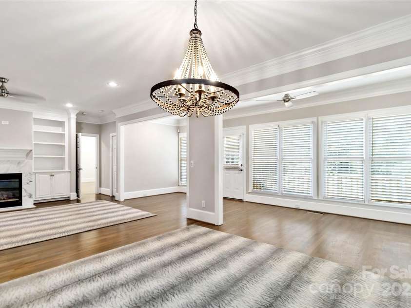 5916 Bridger Court, Charlotte, NC 28211.  MLS# CAR4184678, YatesRealty ID 10123. Family room and breakfast room open to a flex room that can be office space or additional sitting room.