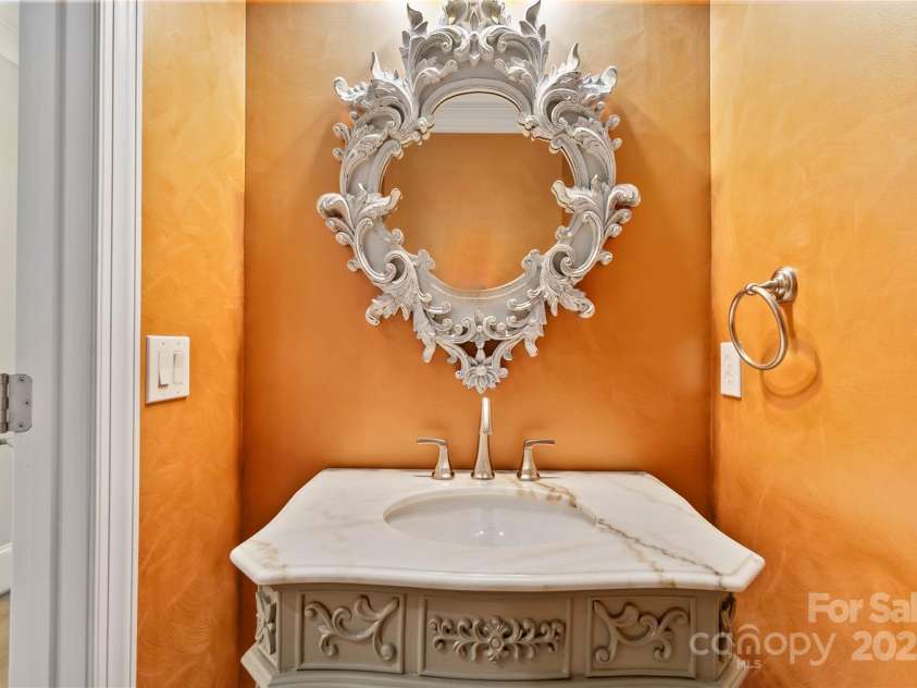 5916 Bridger Court, Charlotte, NC 28211.  MLS# CAR4184678, YatesRealty ID 10123. Gorgeous half bath on main floor