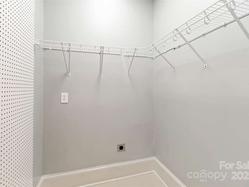 5916 Bridger Court, Charlotte, NC 28211.  MLS# CAR4184678, YatesRealty ID 10123. One of 3 primary walk-in closets