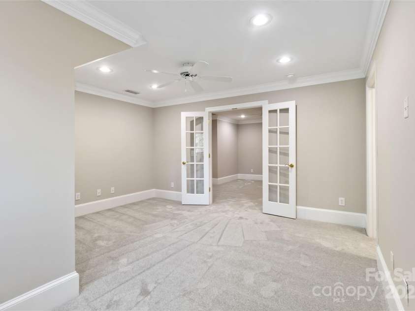 5916 Bridger Court, Charlotte, NC 28211.  MLS# CAR4184678, YatesRealty ID 10123. Upstairs flex room with glass french doors for added privacy.