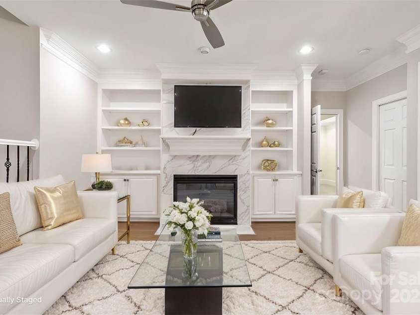 5916 Bridger Court, Charlotte, NC 28211.  MLS# CAR4184678, YatesRealty ID 10123. Virtually staged Family room