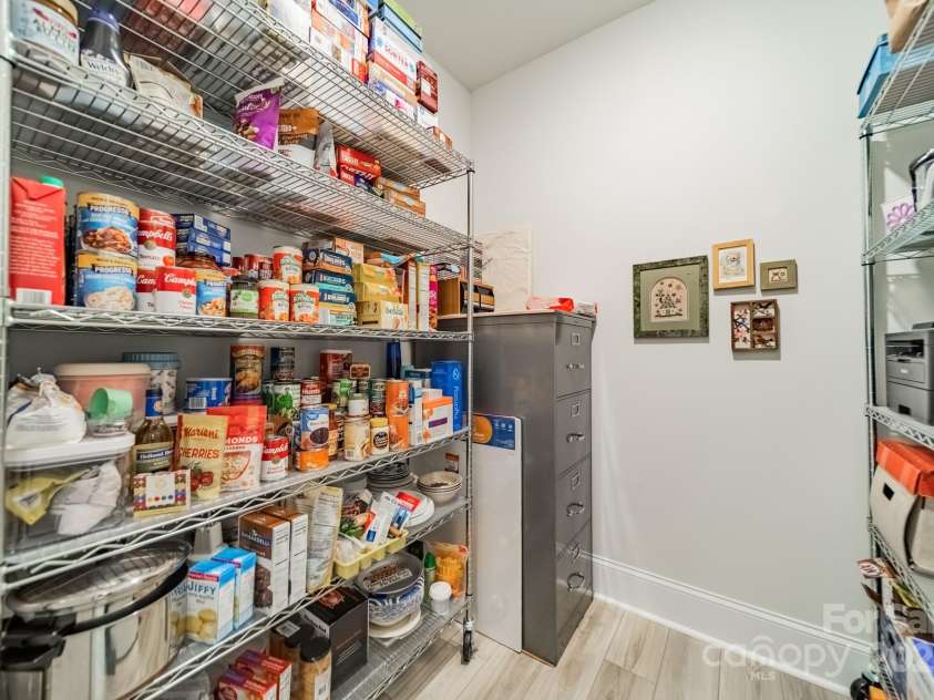 2014 Newstyle Way, Tega Cay, SC 29708.  MLS# CAR4190595, YatesRealty ID 10124. Bonus Walk-in Storage Room/Pantry