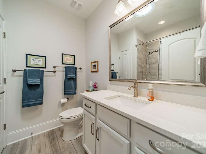 2014 Newstyle Way, Tega Cay, SC 29708.  MLS# CAR4190595, YatesRealty ID 10124. Full Guest Bathroom
