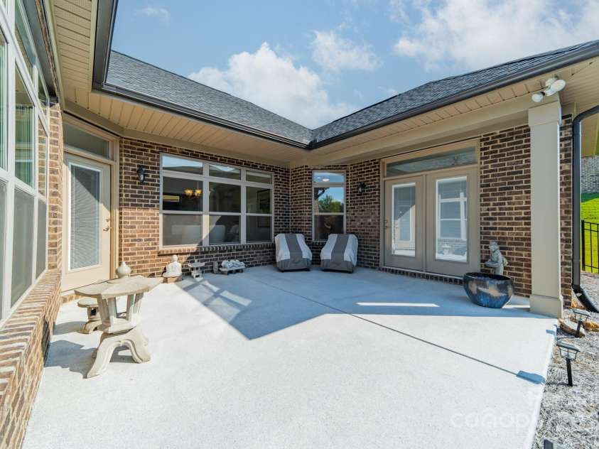 2014 Newstyle Way, Tega Cay, SC 29708.  MLS# CAR4190595, YatesRealty ID 10124. Side Patio