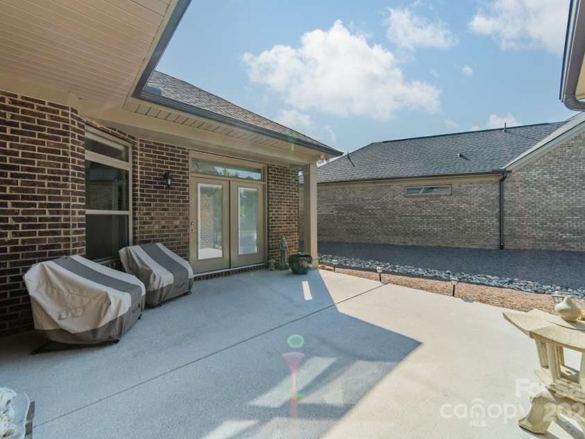 2014 Newstyle Way, Tega Cay, SC 29708.  MLS# CAR4190595, YatesRealty ID 10124. Side Patio