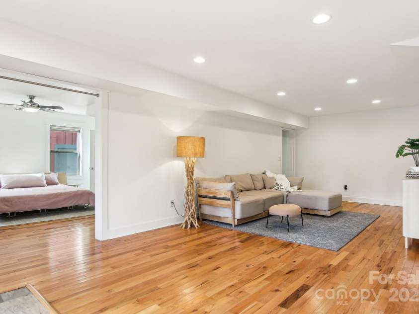 12 Mayfield Road, Asheville, NC 28804.  MLS# CAR4312974, YatesRealty ID 10128. Large living space in finished basement! 