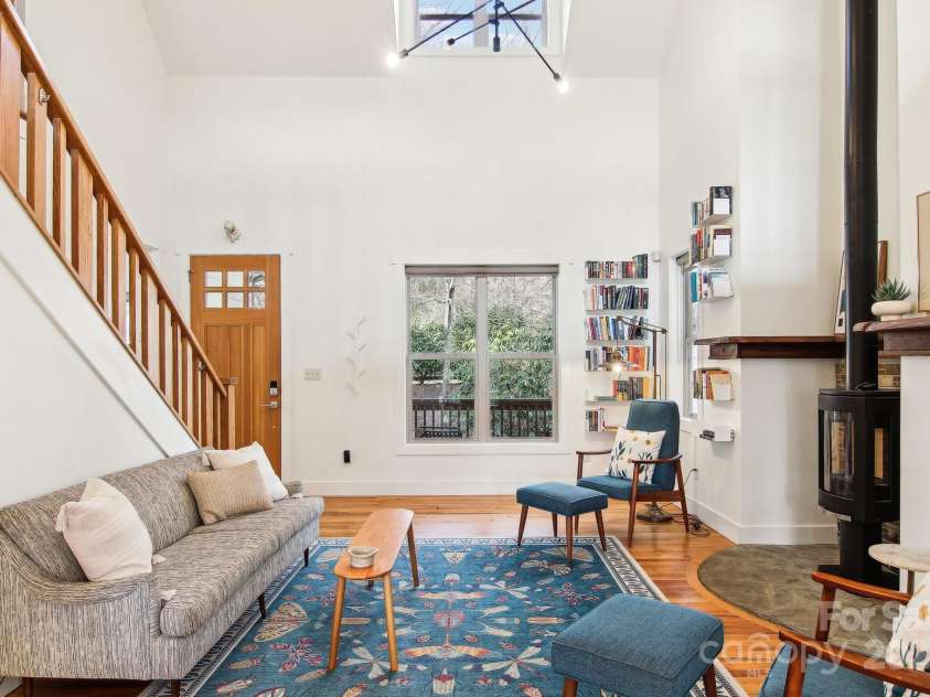 12 Mayfield Road, Asheville, NC 28804.  MLS# CAR4312974, YatesRealty ID 10128. Lovely tucked away stone patio. 