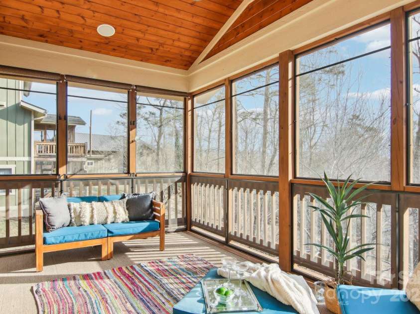 12 Mayfield Road, Asheville, NC 28804.  MLS# CAR4312974, YatesRealty ID 10128. Screened in porch off of dining room & kitchen. 