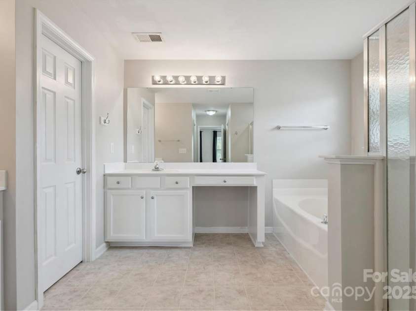 3043 Streamlet Way, Monroe, NC 28110.  MLS# CAR4271540, YatesRealty ID 1013. Primary Bathroom