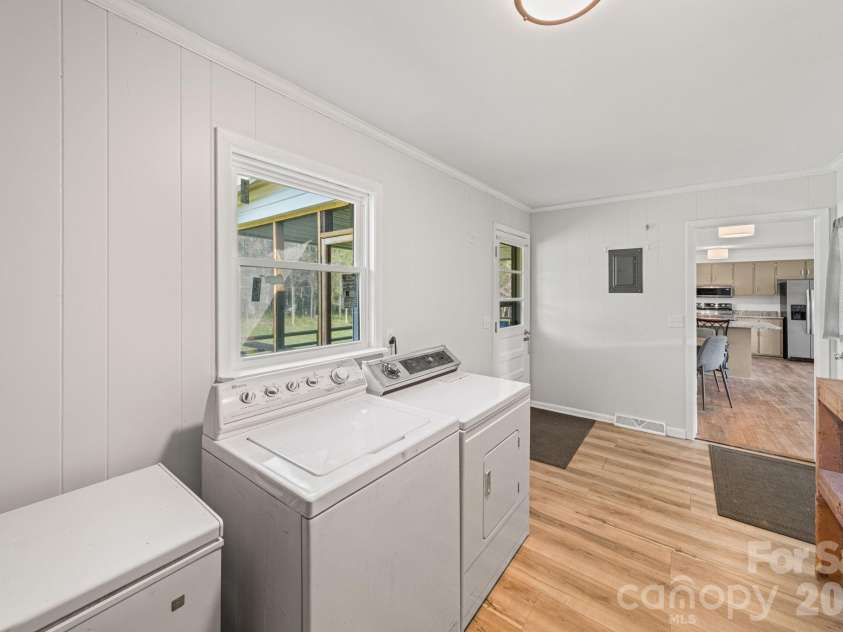 12227 NC 138 Highway, Norwood, NC 28128.  MLS# CAR4366080, YatesRealty ID 10130. Expansive Laundry Room