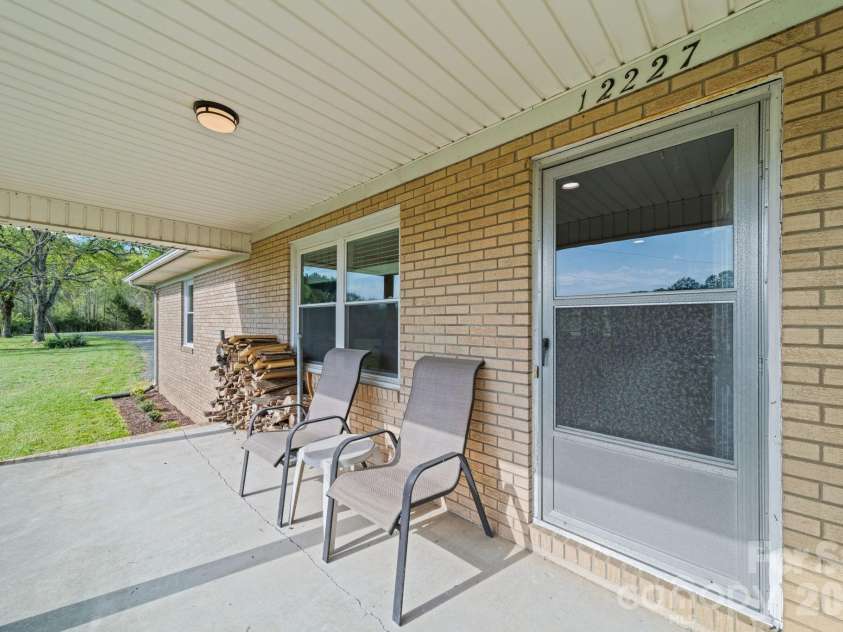 12227 NC 138 Highway, Norwood, NC 28128.  MLS# CAR4366080, YatesRealty ID 10130. Front Porch