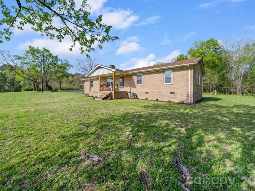 12227 NC 138 Highway, Norwood, NC 28128.  MLS# CAR4366080, YatesRealty ID 10130. Front - Right Side View