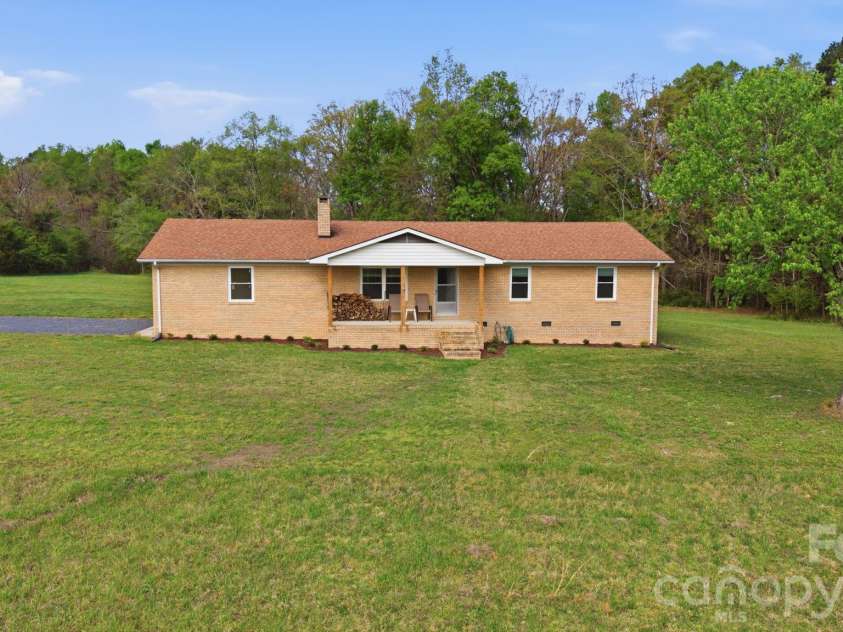 12227 NC 138 Highway, Norwood, NC 28128.  MLS# CAR4366080, YatesRealty ID 10130. Front View