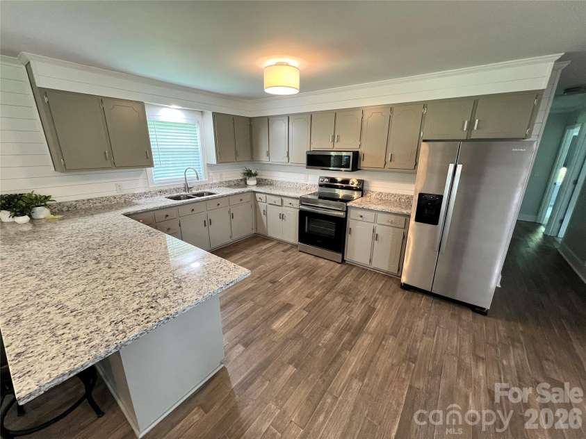 12227 NC 138 Highway, Norwood, NC 28128.  MLS# CAR4366080, YatesRealty ID 10130. Kitchen