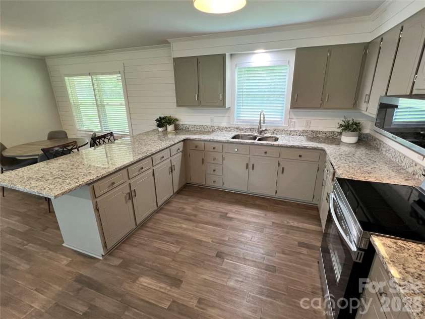 12227 NC 138 Highway, Norwood, NC 28128.  MLS# CAR4366080, YatesRealty ID 10130. Kitchen