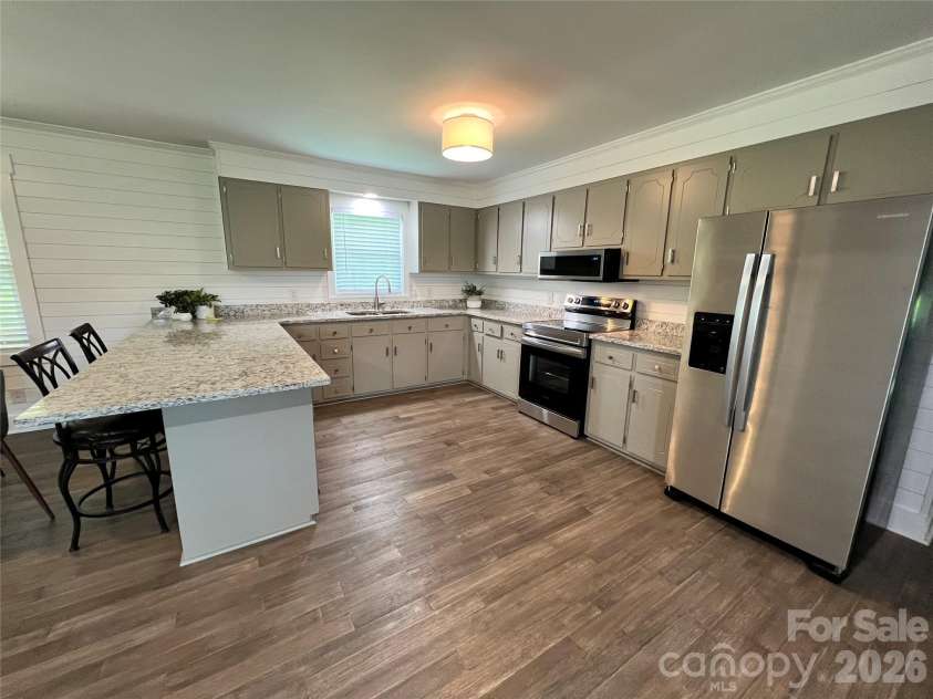 12227 NC 138 Highway, Norwood, NC 28128.  MLS# CAR4366080, YatesRealty ID 10130. Kitchen