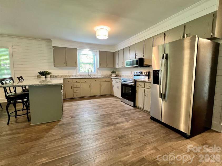 12227 NC 138 Highway, Norwood, NC 28128.  MLS# CAR4366080, YatesRealty ID 10130. Kitchen