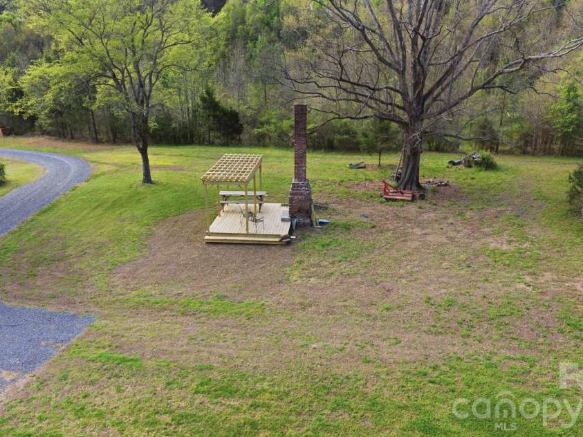 12227 NC 138 Highway, Norwood, NC 28128.  MLS# CAR4366080, YatesRealty ID 10130. Side Yard