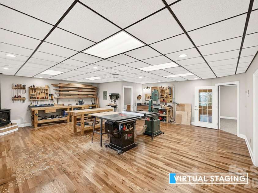 86 Distant View Drive, Asheville, NC 28803.  MLS# CAR4367971, YatesRealty ID 10131. Lowest level flex room could be workshop which is what the current onwer used it for or game room.
