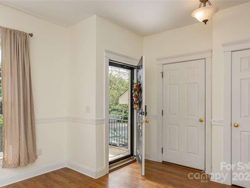 168 Carolina Bluebird Loop, Arden, NC 28704.  MLS# CAR4243265, YatesRealty ID 10134. Entrance with Hardwood Floors