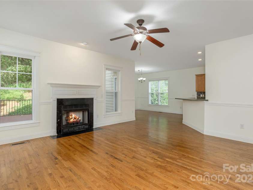 168 Carolina Bluebird Loop, Arden, NC 28704.  MLS# CAR4243265, YatesRealty ID 10134. Family Room towards Breakfast Area