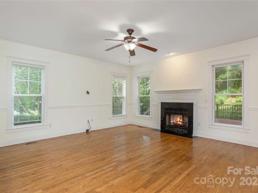 168 Carolina Bluebird Loop, Arden, NC 28704.  MLS# CAR4243265, YatesRealty ID 10134. Family Room with Gas Fireplace