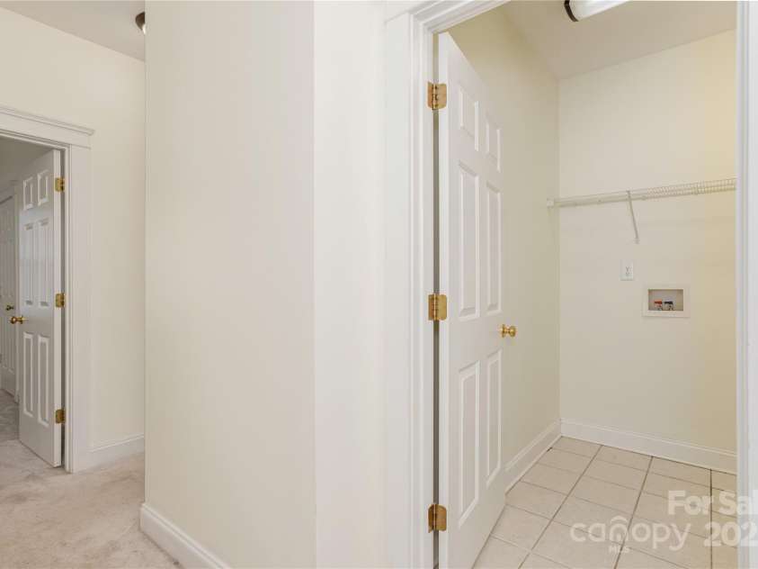 168 Carolina Bluebird Loop, Arden, NC 28704.  MLS# CAR4243265, YatesRealty ID 10134. Upstairs Laundry Room