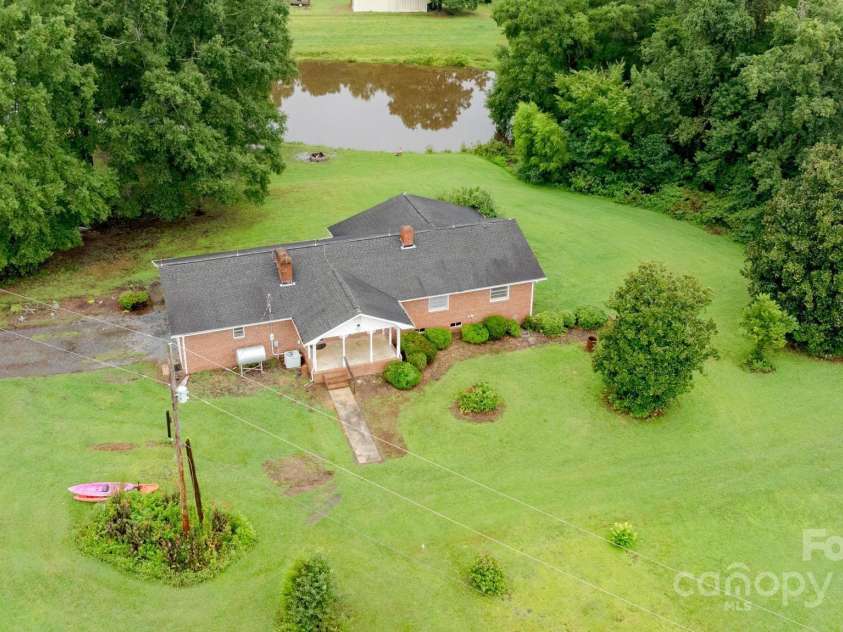 215 Big Buck Road, Richfield, NC 28137.  MLS# CAR4292677, YatesRealty ID 10134. 