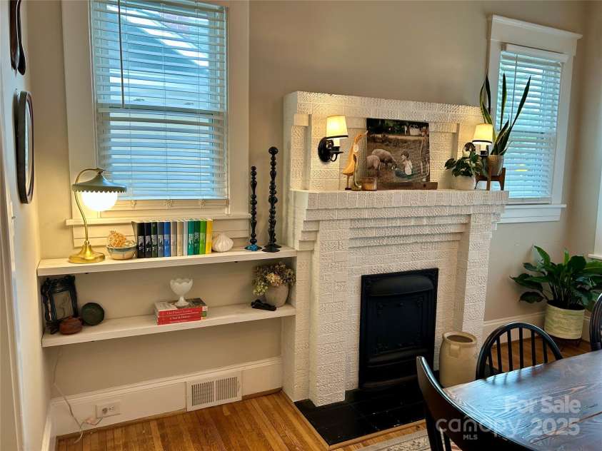 705 Fulton Street, Salisbury, NC 28144.  MLS# CAR4248091, YatesRealty ID 10143. Fireplace detail with built-in shelving