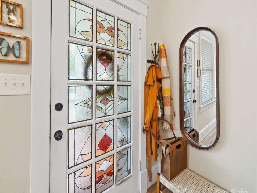 705 Fulton Street, Salisbury, NC 28144.  MLS# CAR4248091, YatesRealty ID 10143. Front door with custom stained glass