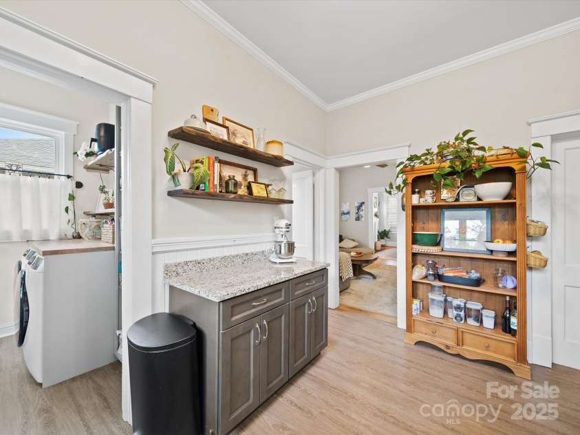 705 Fulton Street, Salisbury, NC 28144.  MLS# CAR4248091, YatesRealty ID 10143. Kitchen with view to laundry room