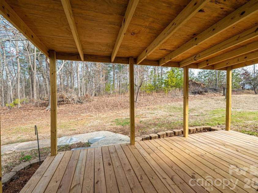4791 Helton Road, Granite Falls, NC 28630.  MLS# CAR4352556, YatesRealty ID 10146. Brand new covered back deck!  