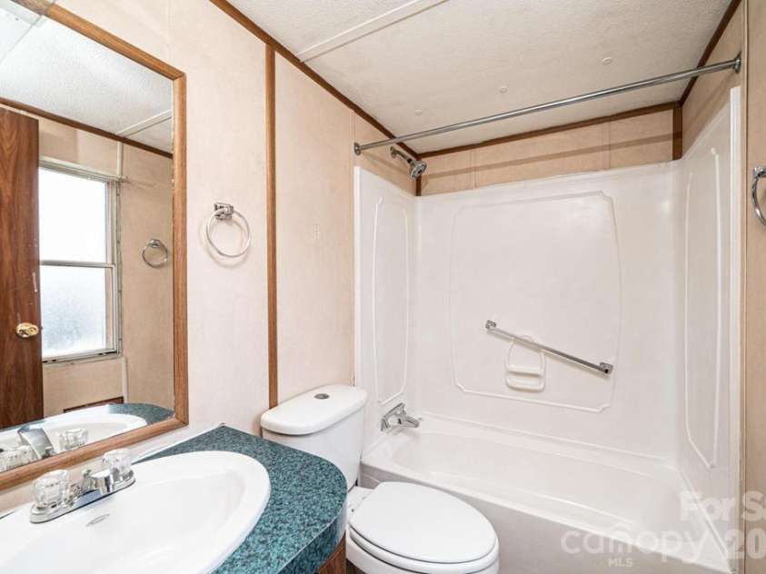 4791 Helton Road, Granite Falls, NC 28630.  MLS# CAR4352556, YatesRealty ID 10146. Guest bath in the hall! 