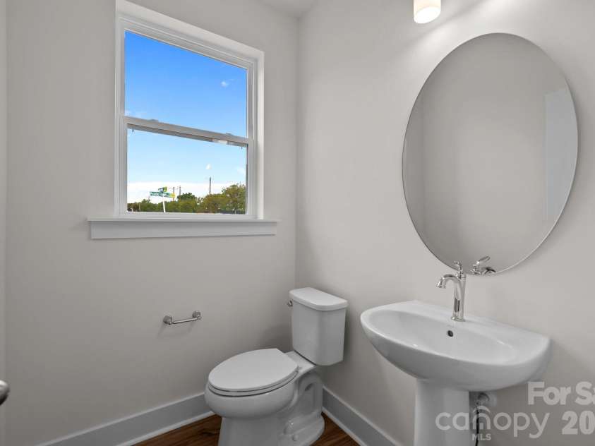 2930 Clyde Drive, Charlotte, NC 28208.  MLS# CAR4368243, YatesRealty ID 10149. Representative PhotoPowder Room on Main