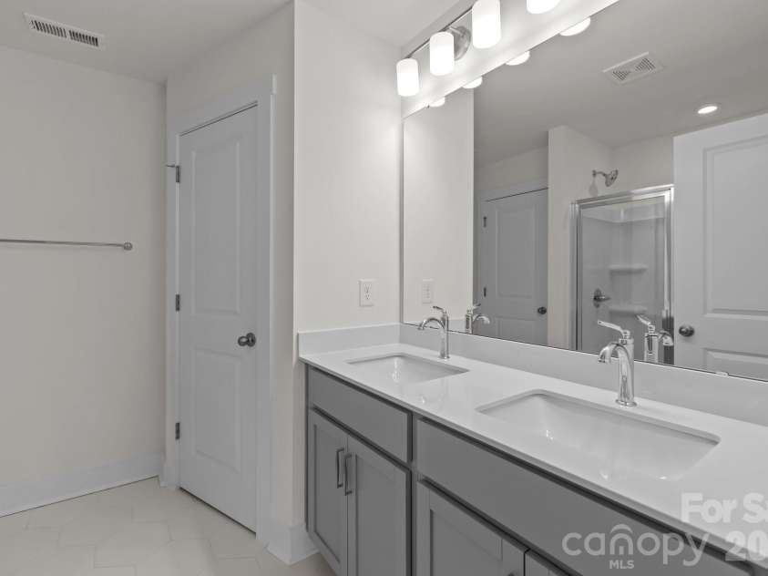 2930 Clyde Drive, Charlotte, NC 28208.  MLS# CAR4368243, YatesRealty ID 10149. Representative PhotoPrimary Bathroom